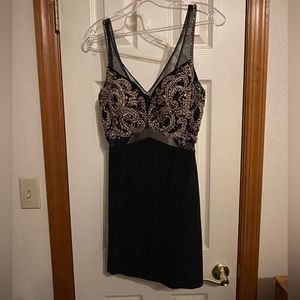 Short formal black dress with beading and sequins